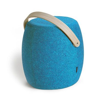 A blue stool with a handle on top of it.