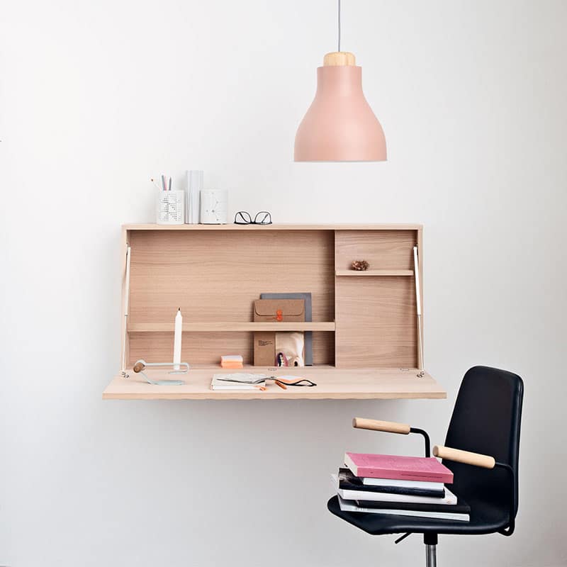 A desk with some books and glasses on it