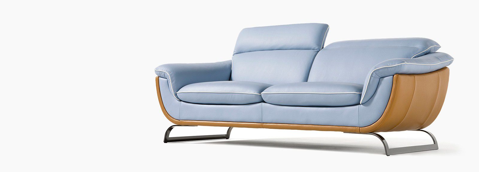 A light blue couch with wooden arms and legs.